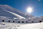 Übernachtung mit Käsefondue im 4er-Iglu